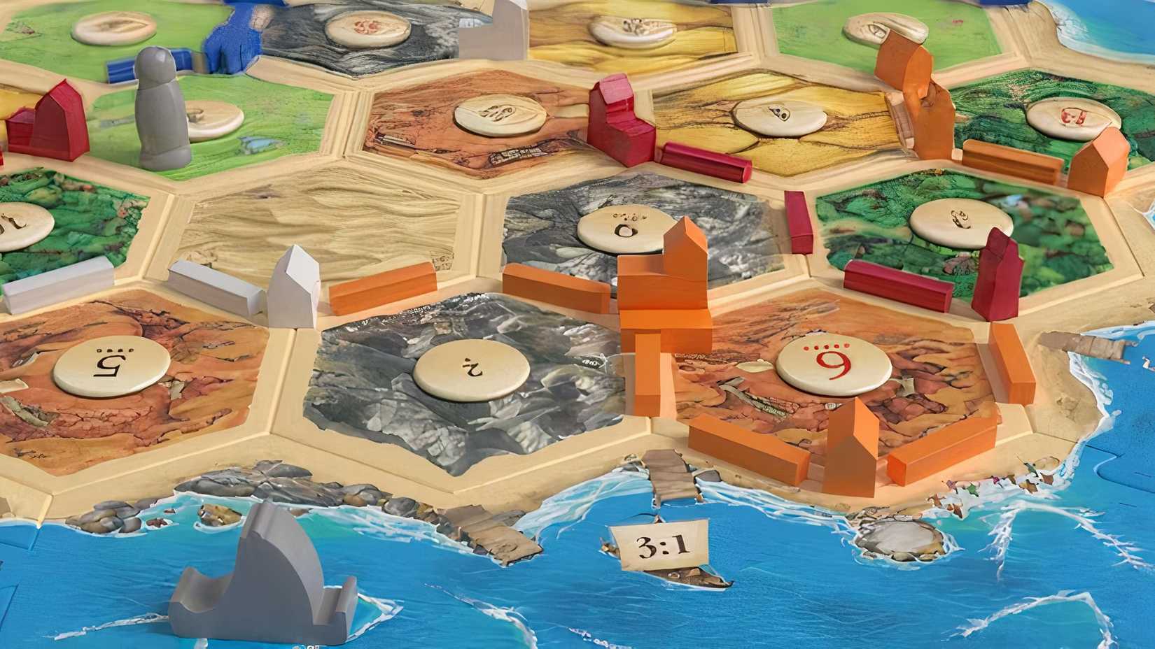 City pieces on the Catan board from the City and Knights expansion.
