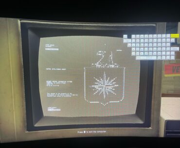 What do i do at this computer thats behind the gate room?