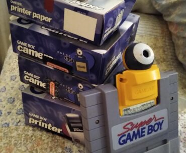 Digging through my childhood bedroom this weekend. Found my GB Camera stash. Three cams, printer, unopened box of paper, and a Super GB.