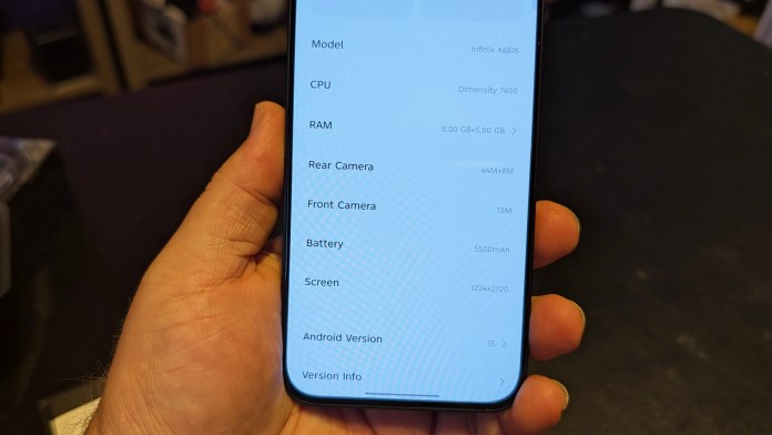Close-up of an Infinix GT 30 smartphone display showing system information, including model, CPU, RAM, camera specs, battery capacity, screen resolution, and Android version.