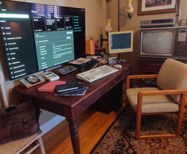 My 'lived in' battlestation. Five years old and still chugging along just fine. Intel i9-10980XE 18C/36T, 40GB VRAM, 256GB RAM.
