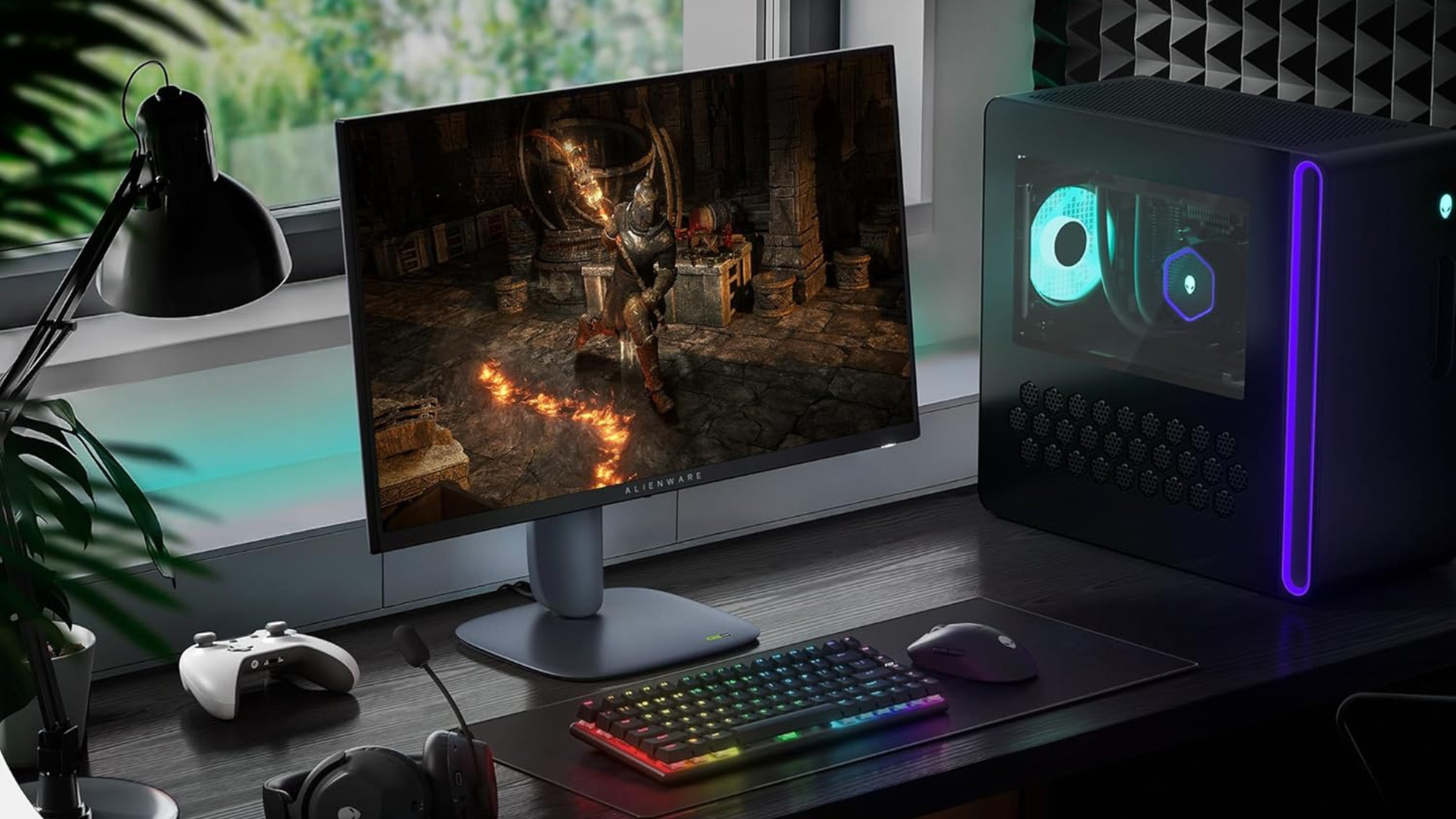 Alienware 27 Gaming Monitor - AW2725DM on a desk next to PC