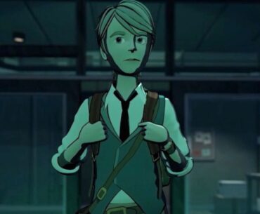 A young man wearing a backpack in a darkened room