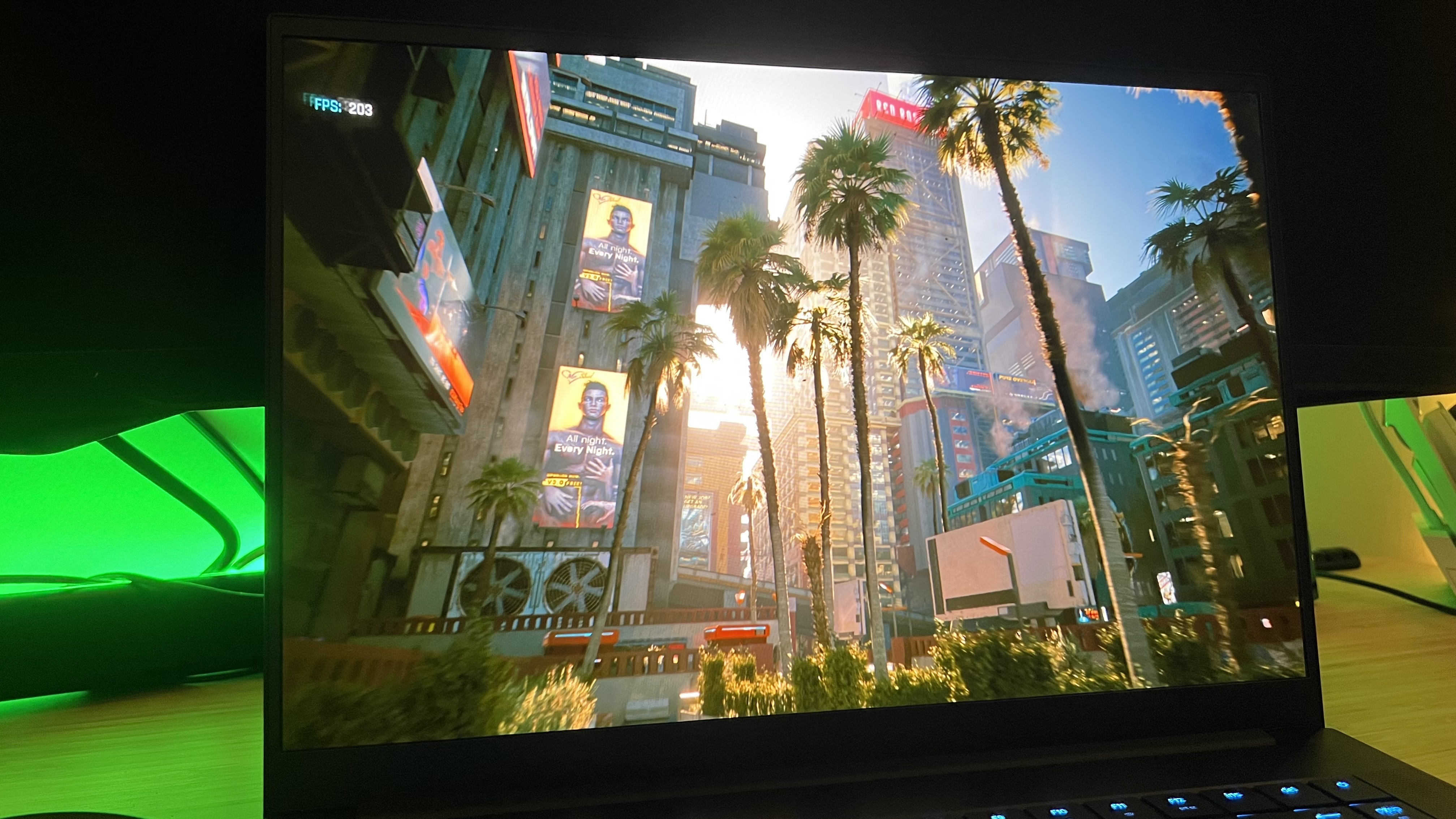 Razer Blade 16 2025 gaming laptop running Cyberpunk 2077 with DLSS enabled