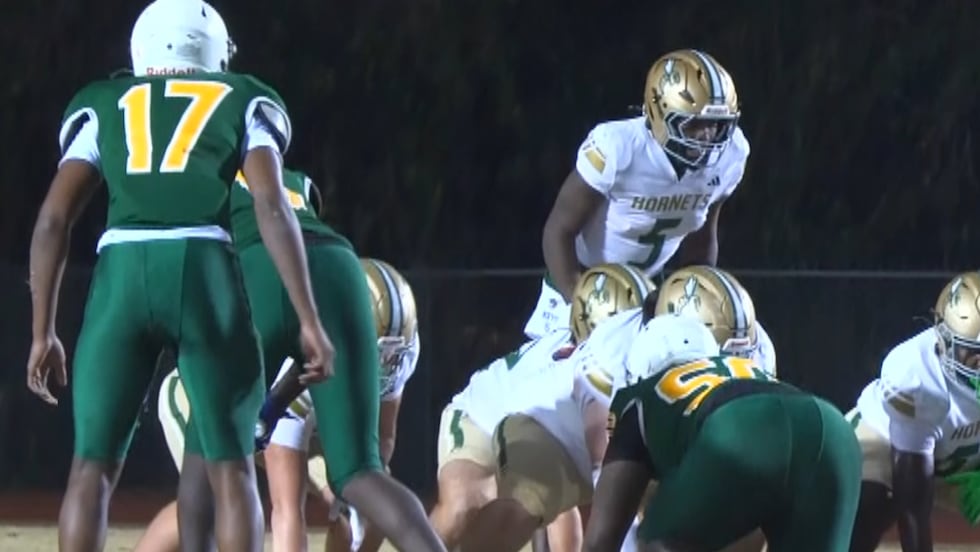 Poplarville runningback Ty Keys prepares for a direct snap during the Hornets' Round 3 contest...