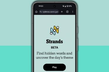 NYT Strands homescreen on a mobile phone screen, on a light blue background