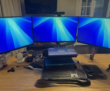 Help me optimize my dual-MacBook / triple-monitor setup