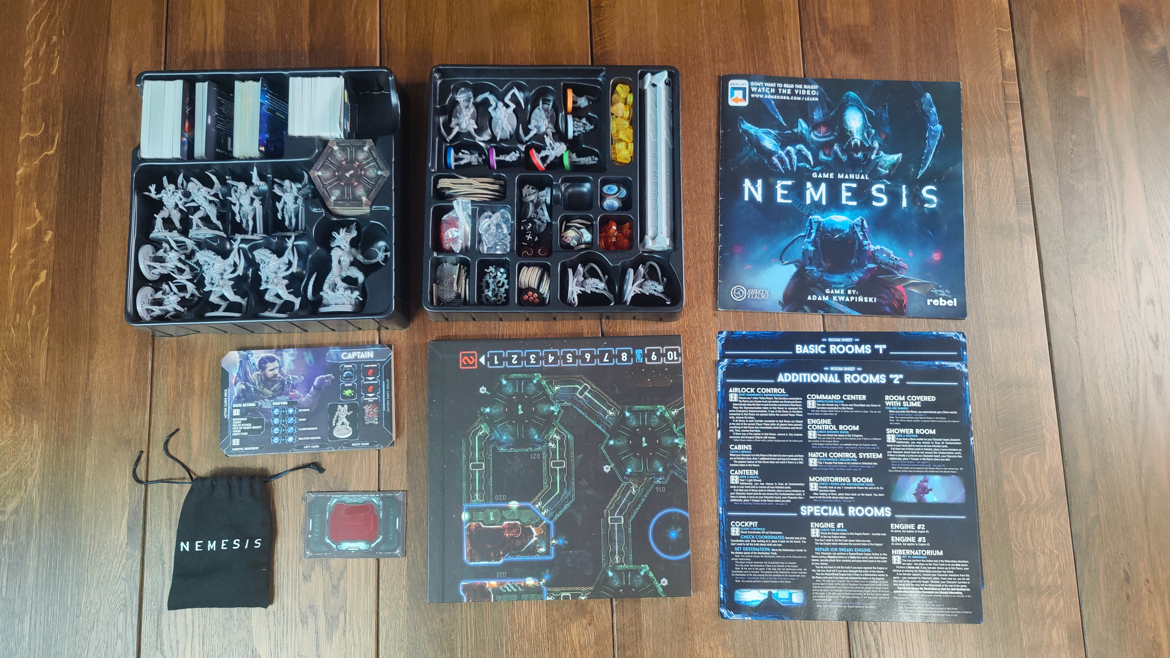 Everything included in the Nemesis board game.
