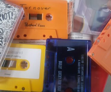 The desktop was littered with cassettes(Neuromancer)