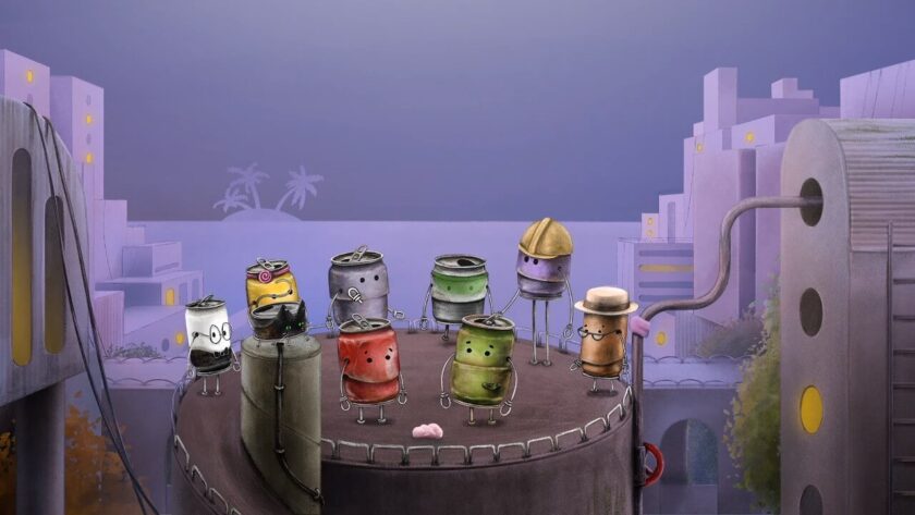 Eight tins cans and a black tin can cat at the top of the tower. Published on LadiesGamers.
