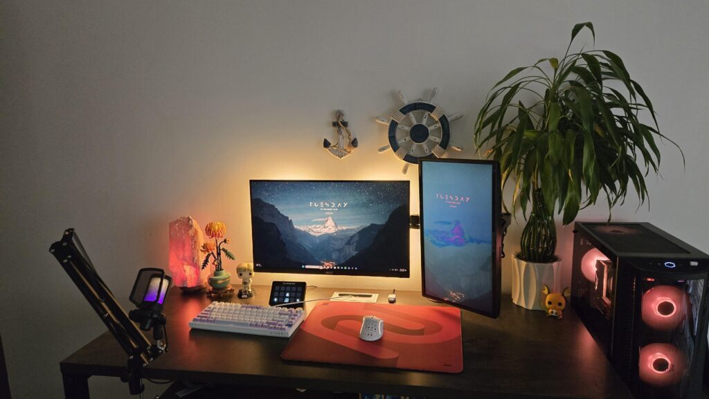 How could I make my setup cozier and feel less cluttered. I have a 55 inch desk.