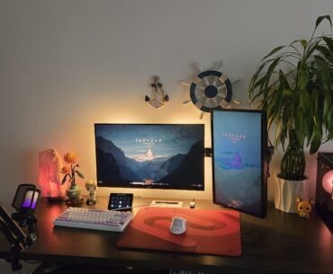 How could I make my setup cozier and feel less cluttered. I have a 55 inch desk.