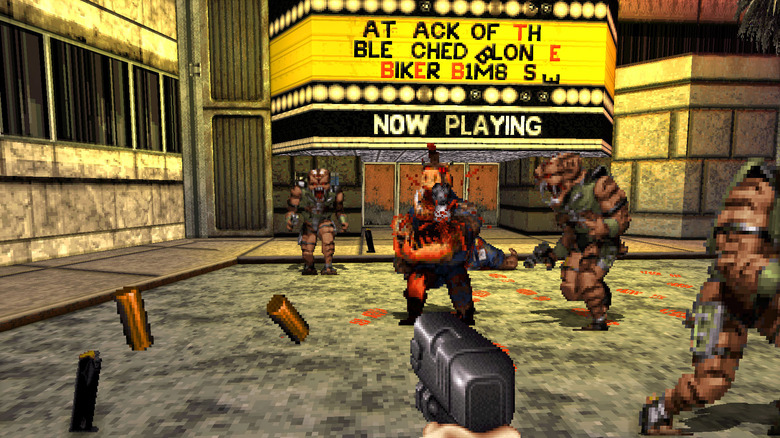Duke Nukem (Jon St. John) plays aliens outside an adult movie theater in Duke Nukem 3D