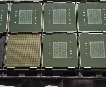 Found this tray of incomplete processors in a box behind an old IBM plant. Any info on what they may be?