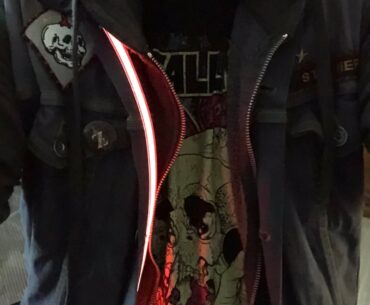 Some LED fashion stuff I tried out years ago. Thinking about giving it another go. Electroluminescent panel in front. Plastic, spray paint, and LED strips on the back patch.
