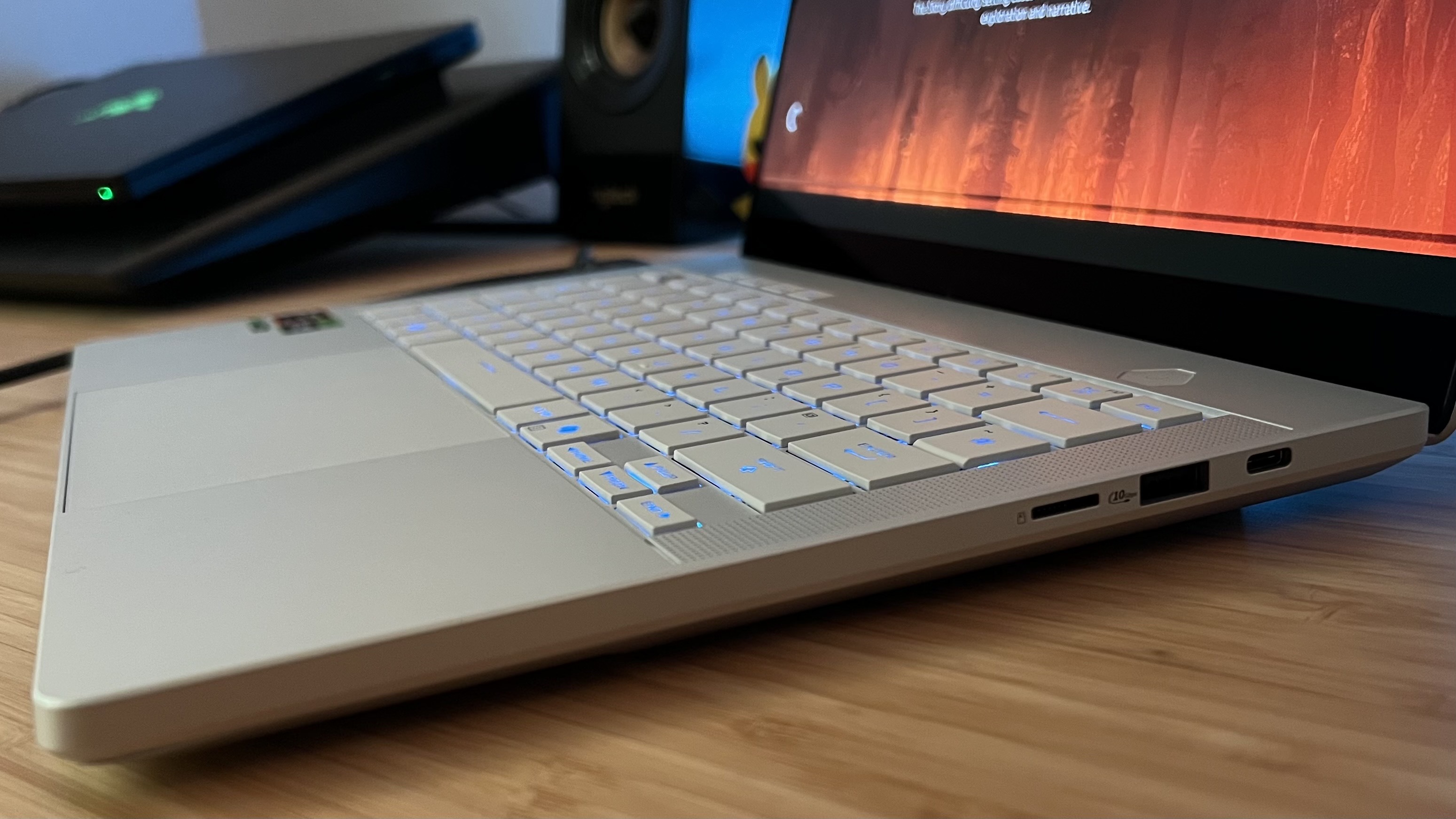 Side of Asus ROG Zephyrus G14 showing ports and thickness