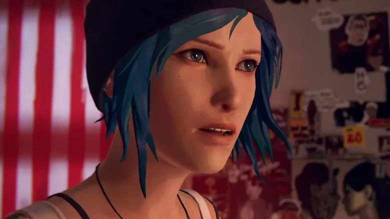 Chloe Price stands in a bedroom in 