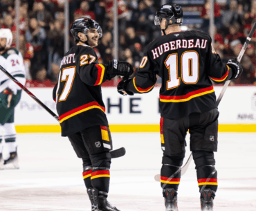 Flames score 3 in 3rd, end Wild's point streak at 12 games