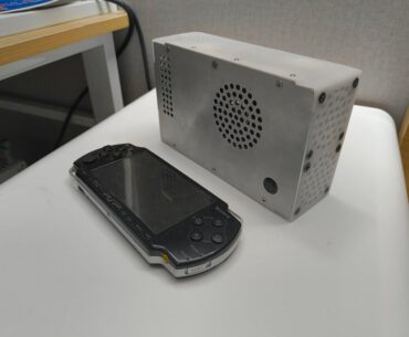 I made a PC small enough for my jacket. Sub 1L capacity, desktop GPU, no power adapter needed. PSP for scale