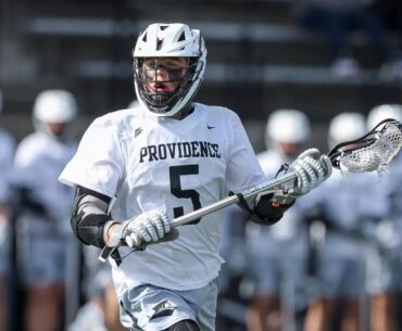 A graphic to announce a schedule change for the men's lacrosse program that says Providence College Lacrosse Schedule Update
