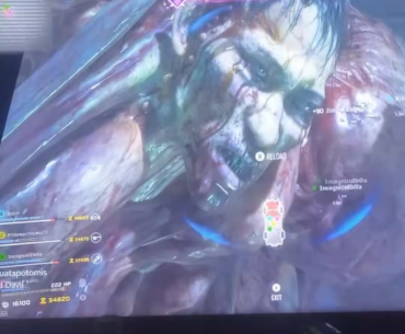 Why are photos of characters flashing and blocking the screen during the Veytharion fight?