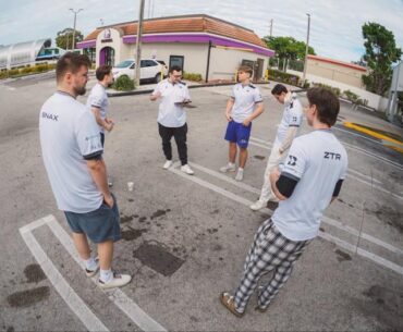 GamerLegion talking strats in a Taco Bell parking lot during Frag Miami