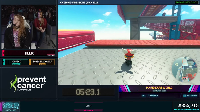 A streamer plays Mario Kart World, next to the screen of the game