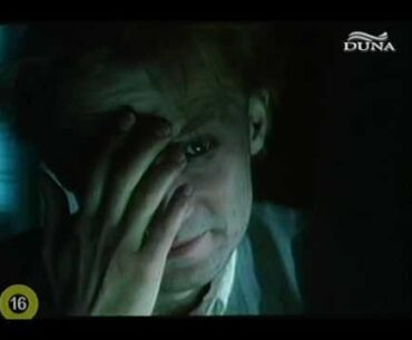 Scene from the Hungarian Cyberpunk film "Meteo" from 1990 featuring a green digital rain effect. The character "Felhőcske" (Little Cloud) is programming in Turbo C