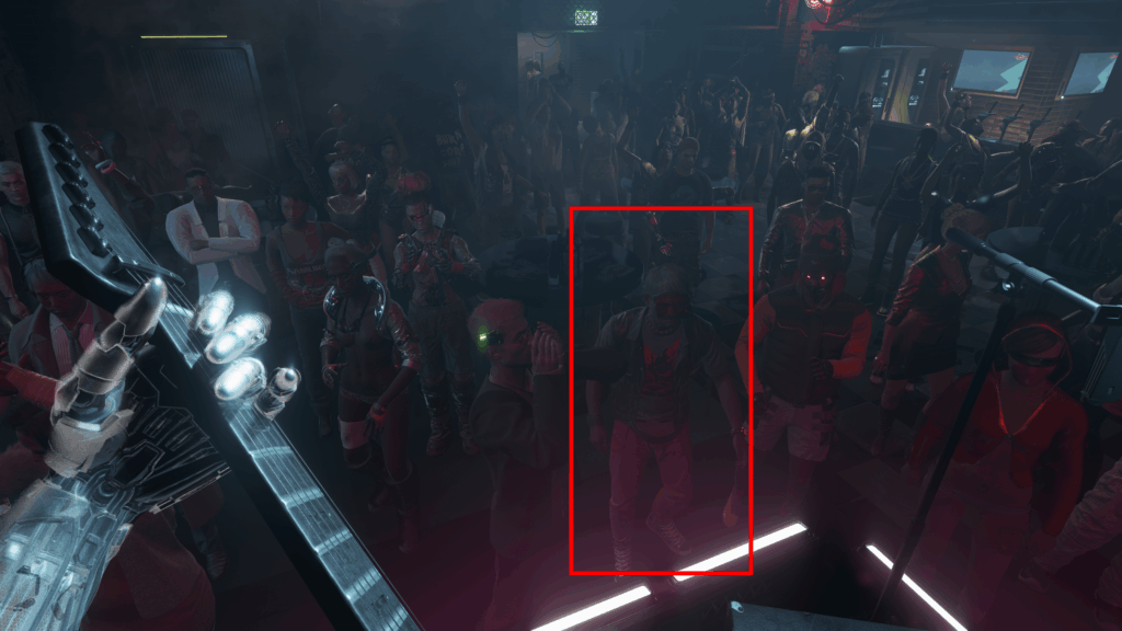 Samurai merch seller from "The Ballad of Buck Ravers" is in the front row of the fans during the gig with Kerry