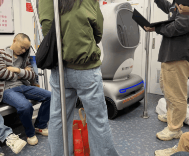The robot is taking the subway