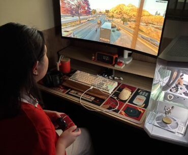 My non-gamer girlfriend is testing my new Ultrawide. She stops at red lights in GTA V, and I love her.