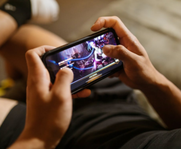 A person holding a phone

AI-generated content may be incorrect.