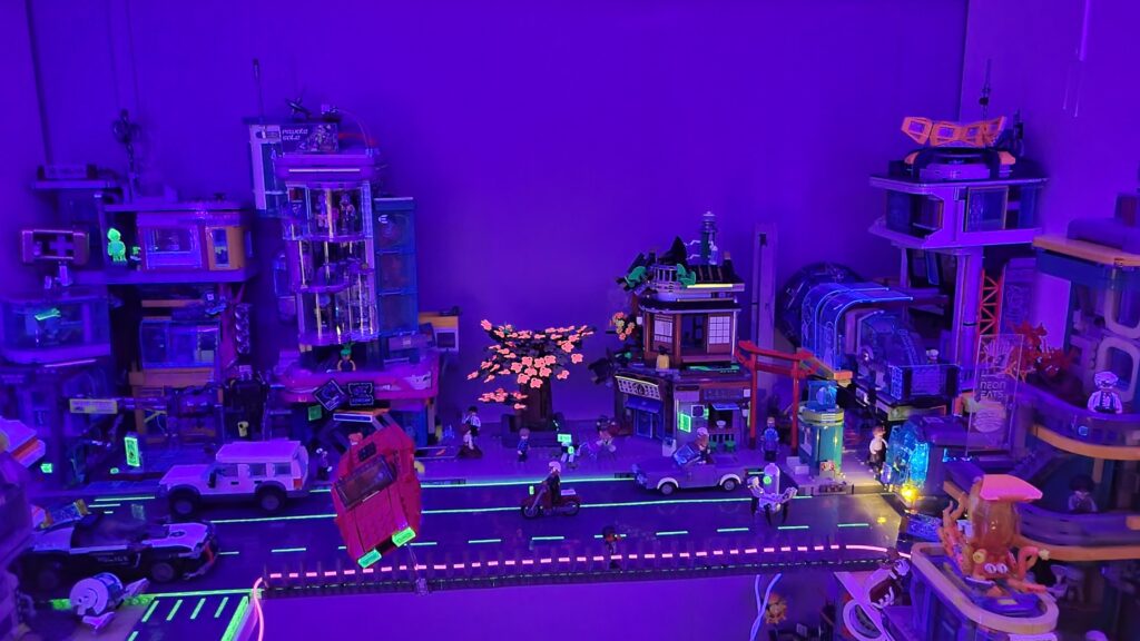 Awesome looking effect using blacklight on miniature cyberpunk city