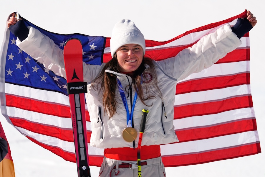 United States' Breezy Johnson celebrates winning the gold medal in the alpine ski women's downhill race, at the 2026 Winter Olympics, in Cortina d'Ampezzo, Italy, Sunday, Feb. 8, 2026.
