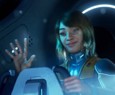 A person in a submarine smiling and waving
