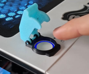 I designed a fighter jet style power button guard for my PC