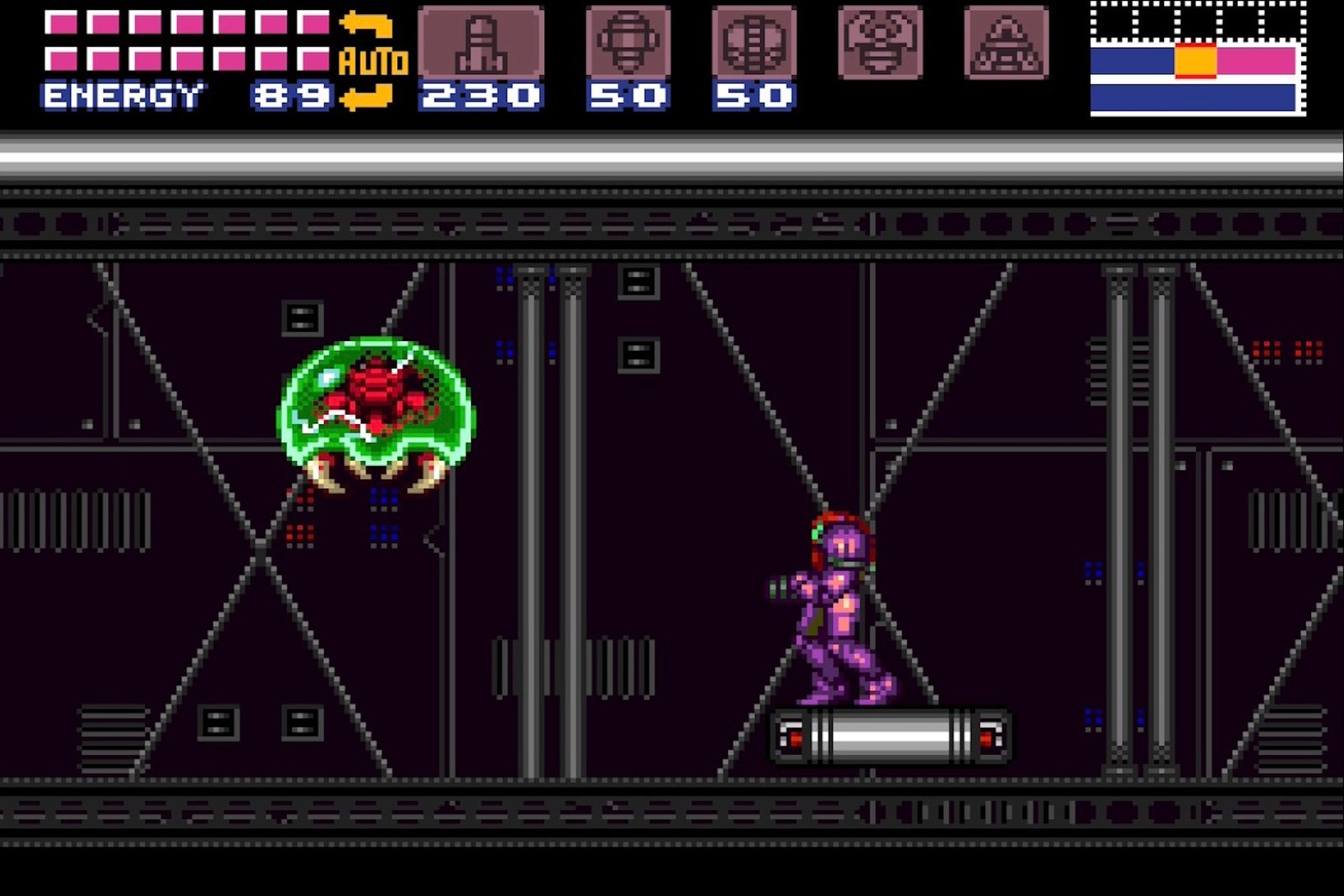 Gameplay from Super Metroid, with Samus Aran eying off an approaching Metroid