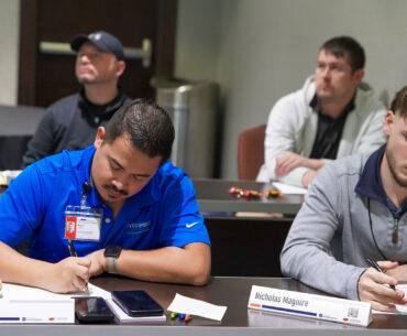 Two male students attend a seminar aimed at strengthening Oklahoma’s tribal gaming workforce.