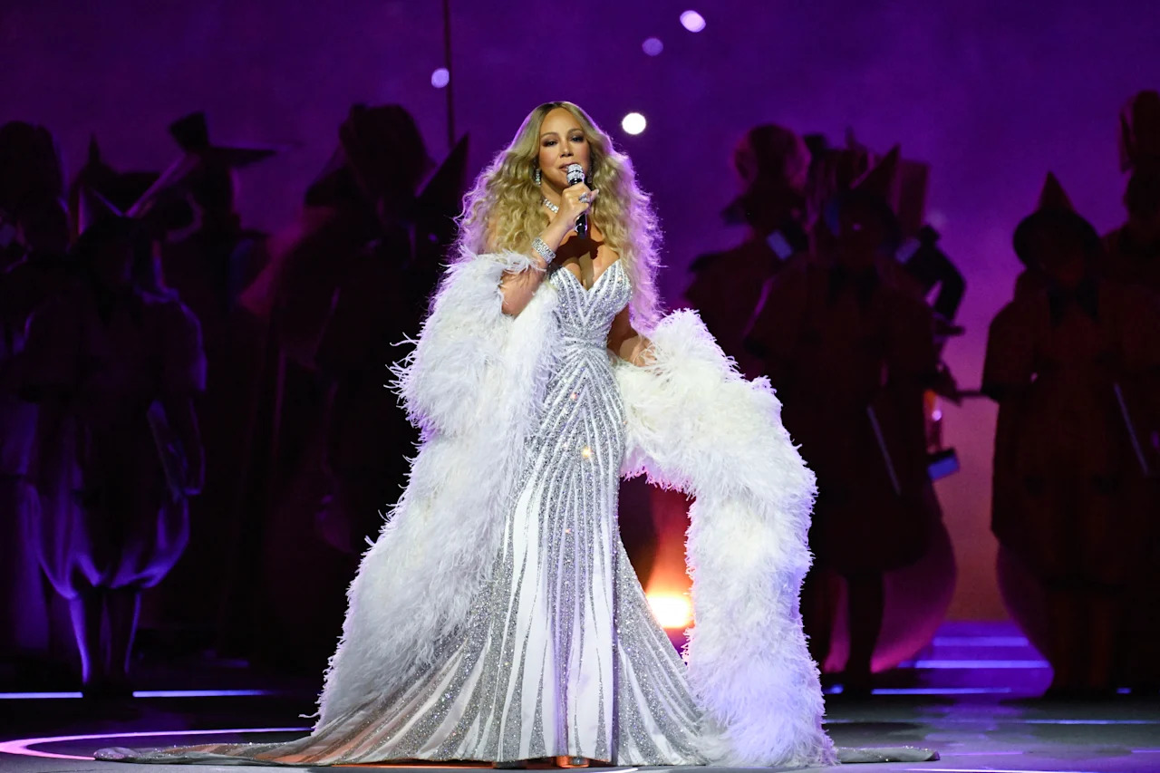 US singer Mariah Carey performs during the opening ceremony of the Milano Cortina 2026 Winter Olympic Games at the San Siro stadium in Milan, northern Italy, on February 6, 2026. (Photo by WANG Zhao / AFP via Getty Images)