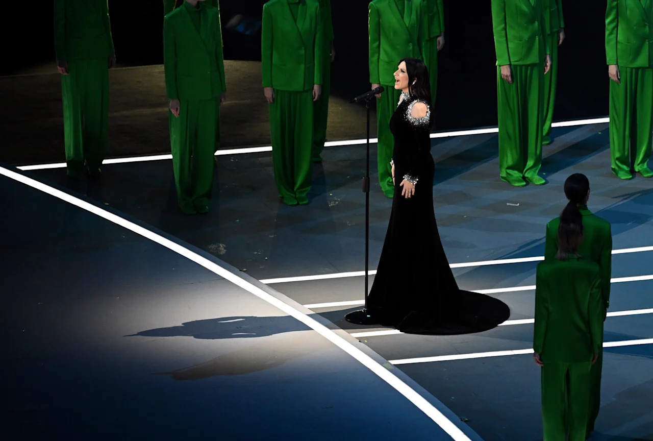 MILAN, ITALY - FEBRUARY 06: Laura Pausini performs the national anthem during the opening ceremony of the Milano Cortina 2026 Winter Olympics at San Siro Stadium on February 06, 2026 in Milan, Italy. (Photo by Matthias Hangst/Getty Images)