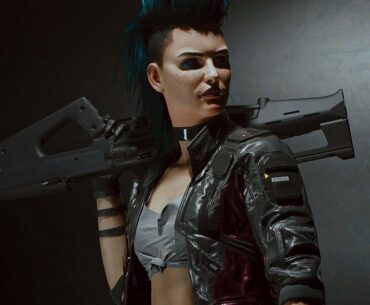 What shotgun is she holding?