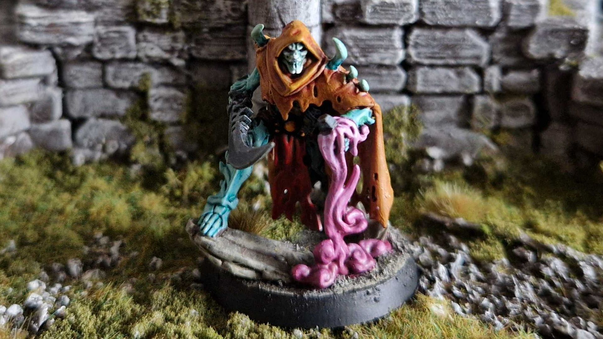 The Ossiarch Bonereapers were my least favorite Warhammer army until the new models, and now my head’s been turned A hooded skeletal figure on a grassy, ruined background