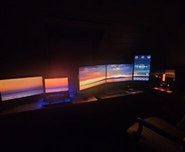 Full desk setup at night