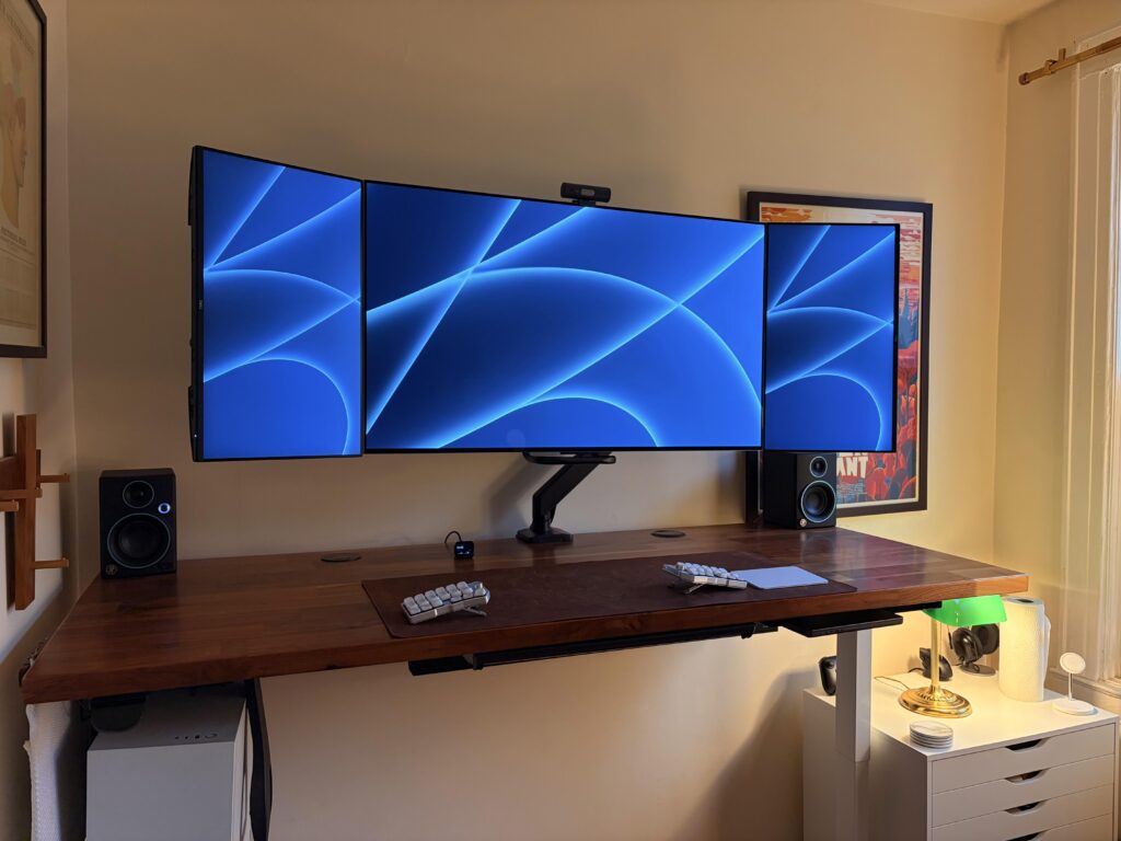 LG OLED 42” TV + two 24” side monitors on ONE monitor arm