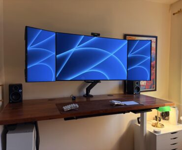 LG OLED 42” TV + two 24” side monitors on ONE monitor arm