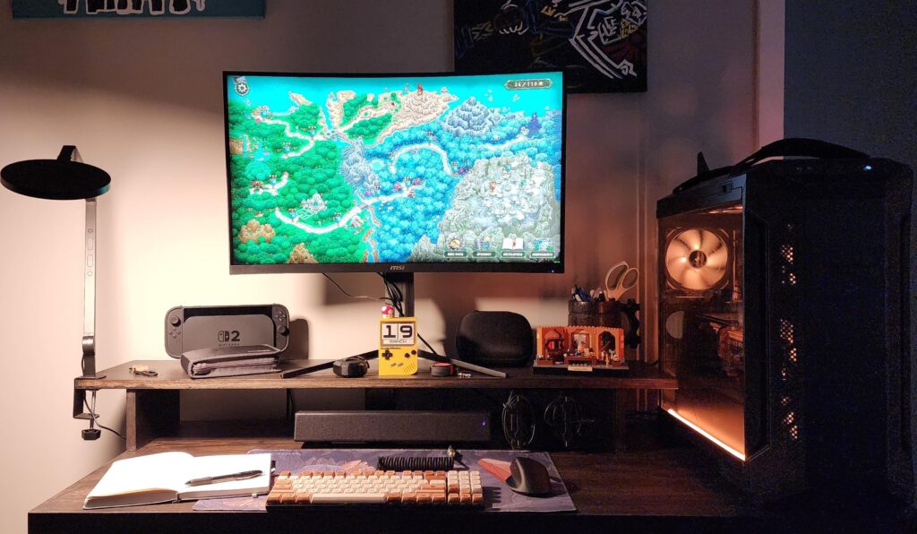 Upgraded from a $100 IKEA desk to $300 worth of solid red oak, whole lot of handiwork, and a custom 3D printed cable box.