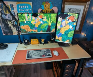 I went from a laptop on a folding table to this with a desk I built. It ain't fancy but I'm really happy with it