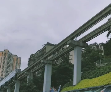 Real life Metro running through residential apartments in Chongqing