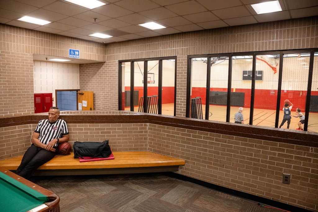 Adrian Dantley, NBA Hall of Famer, waits outside the basketball court at Upper County Community Center prior to refereeing a recreational basketball league game in Gaithersburg, MD.