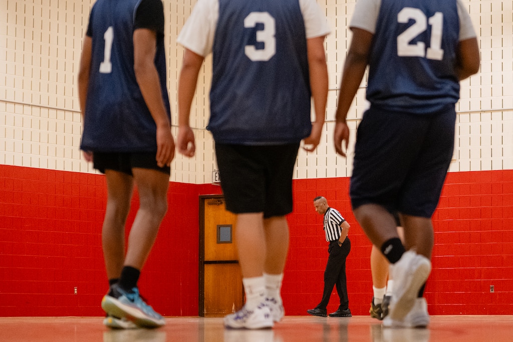 Adrian Dantley, NBA Hall of Famer, referees a recreational basketball league game at Upper County Community Center in Gaithersburg, MD.